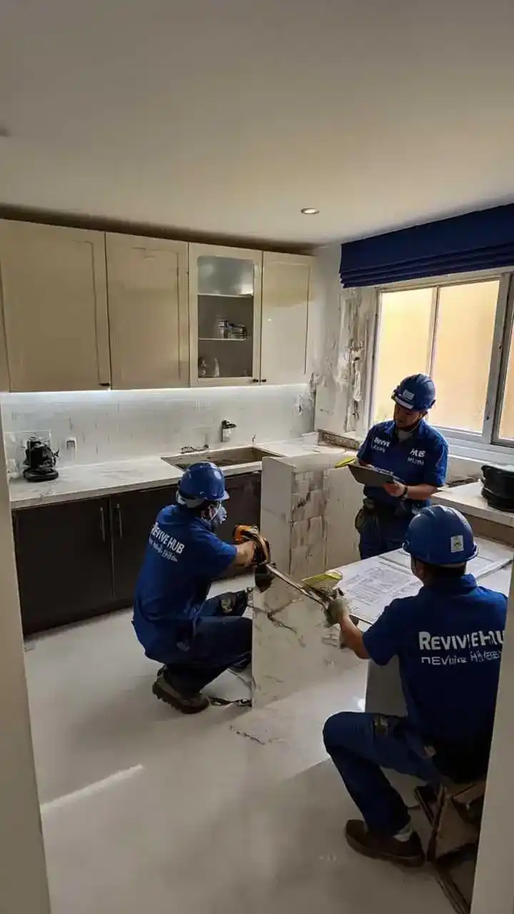 Before Dubai Hills villa kitchen with dark cabinets and uneven lighting