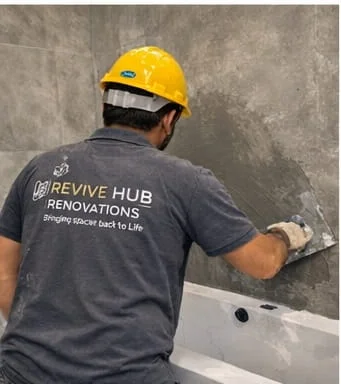 Microcement over tiles Dubai decision gate example with joint filling primer selection mesh reinforcement and correct coat build to prevent cracks and debonding